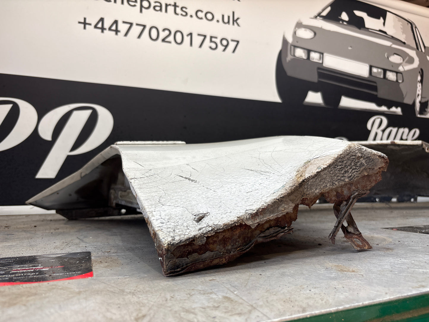 Porsche 944, early front right wing, in need of repair