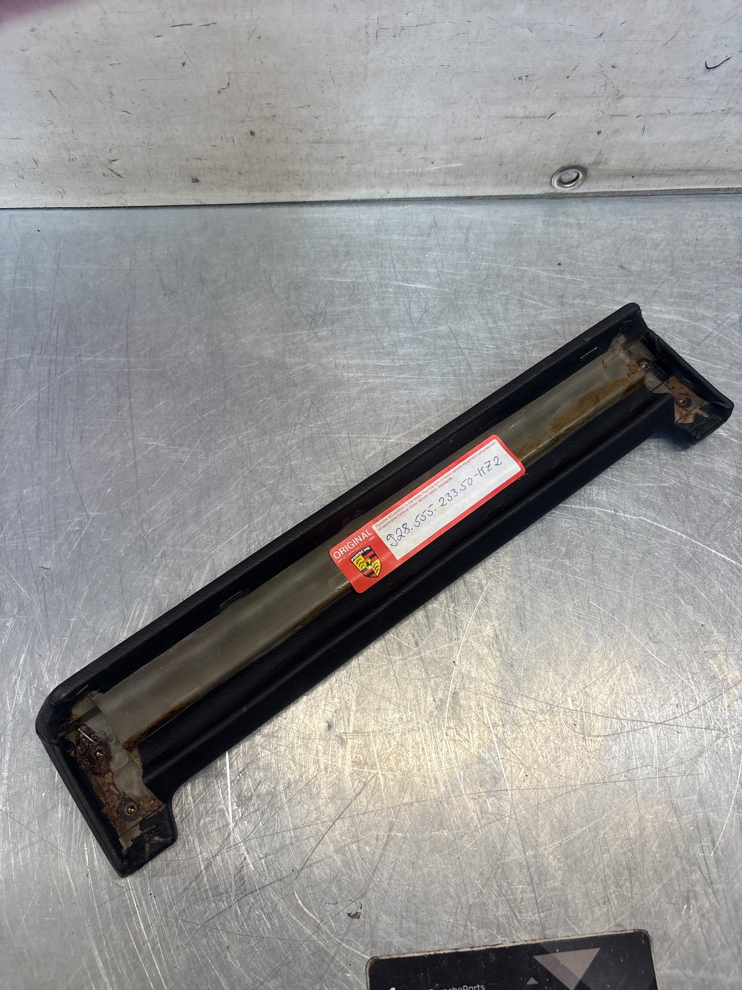 Porsche 928 door armrest lid, 928555233501, black genuine