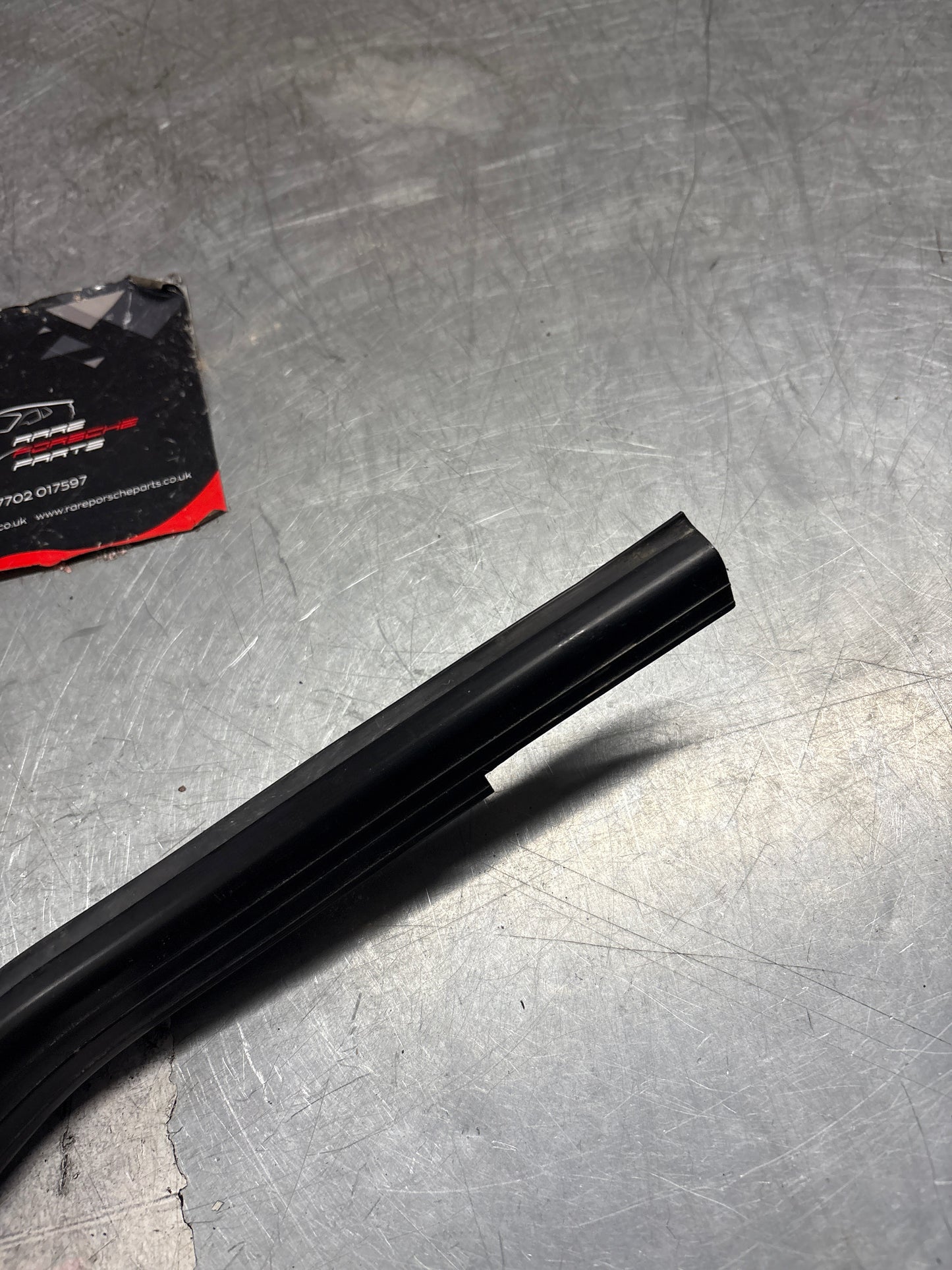 Porsche 944 85.5- left sill trim, scuff plate used 94455112100 cracked