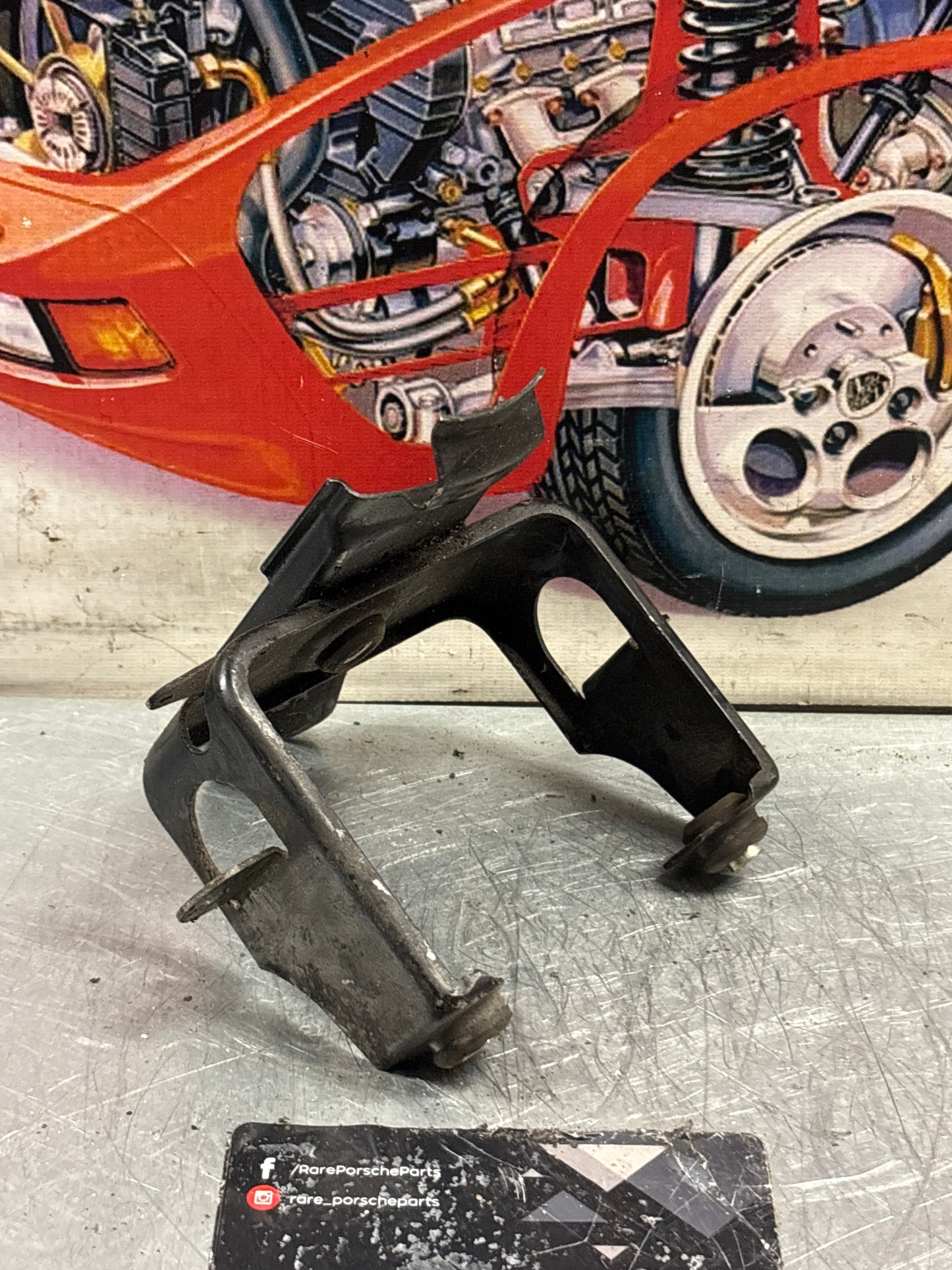 Porsche 928 ABS pump bracket, used 92835504104