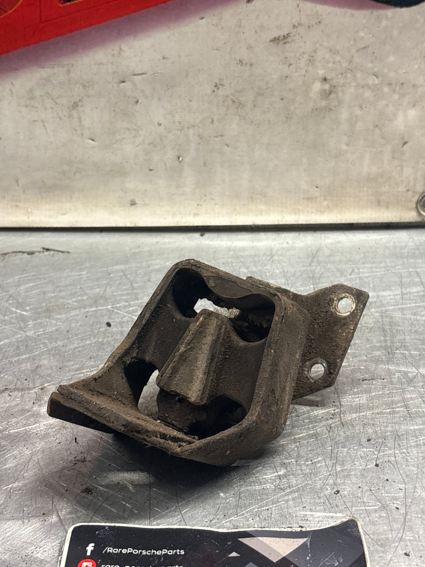 Porsche 924/944 gearbox mount, 477399153J / 94437504500, used