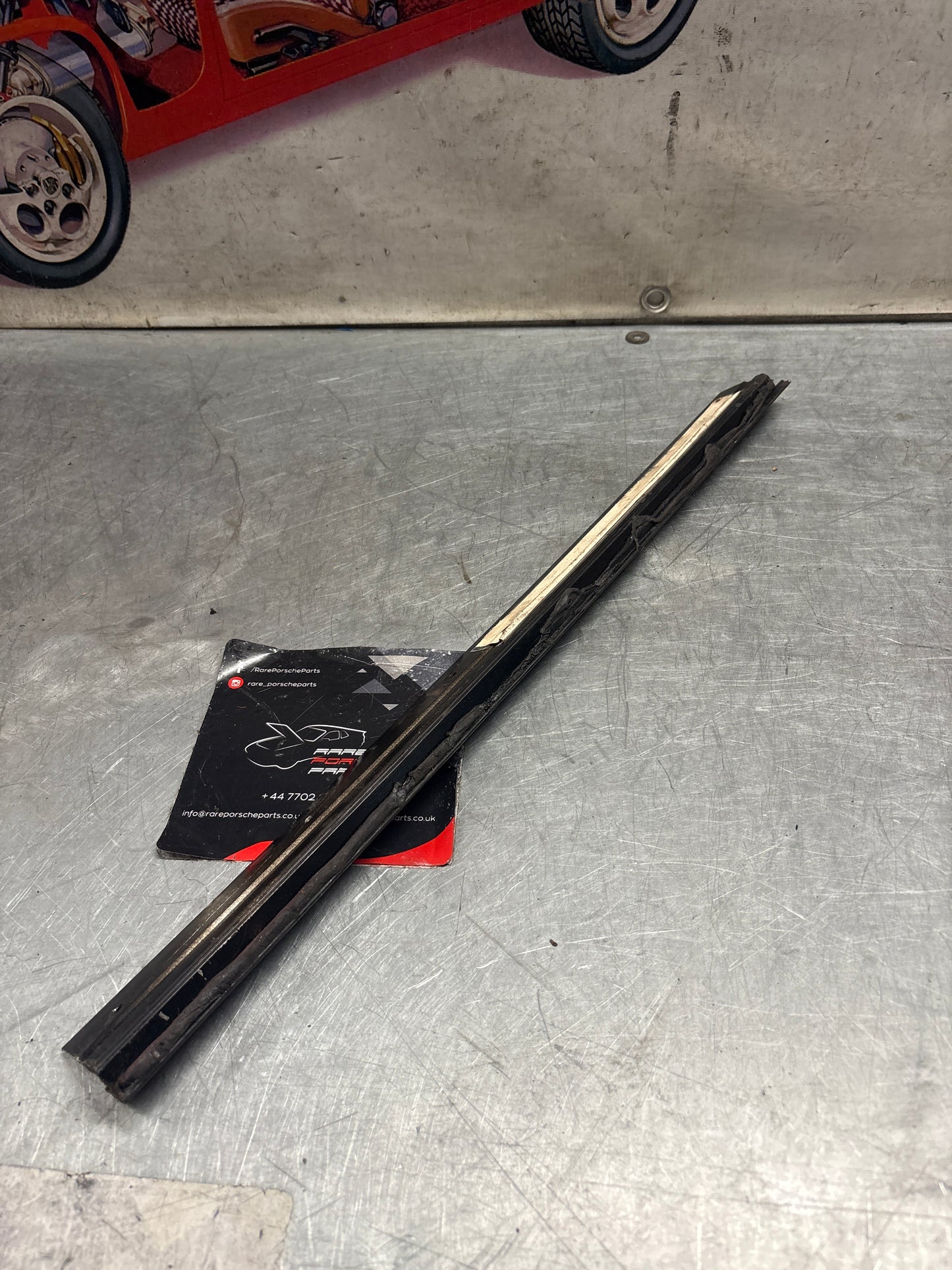 Porsche 928 left sunroof guide rail, used 92856401641