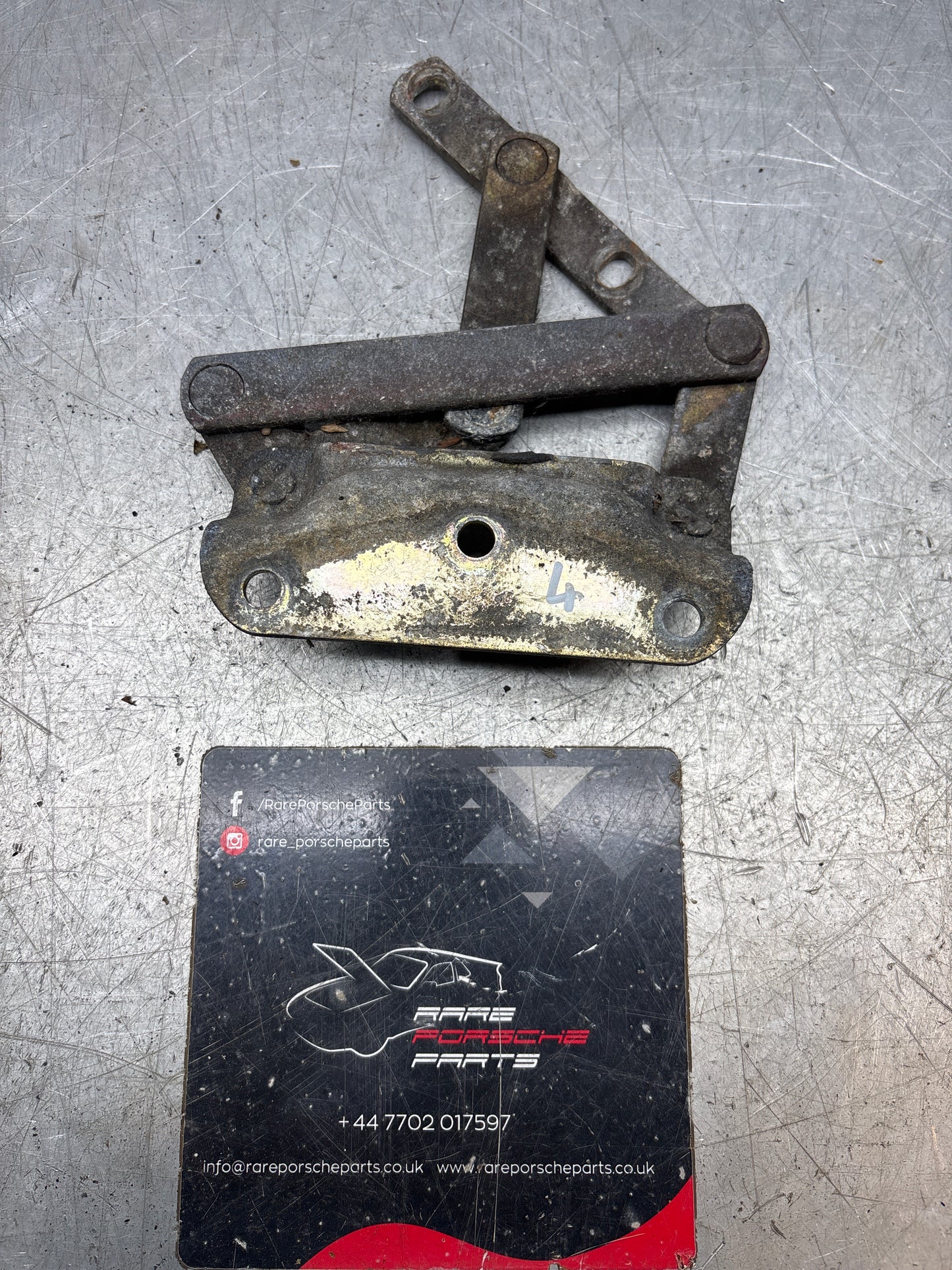 Porsche 928 left hand side bonnet hinge, used 92851104104