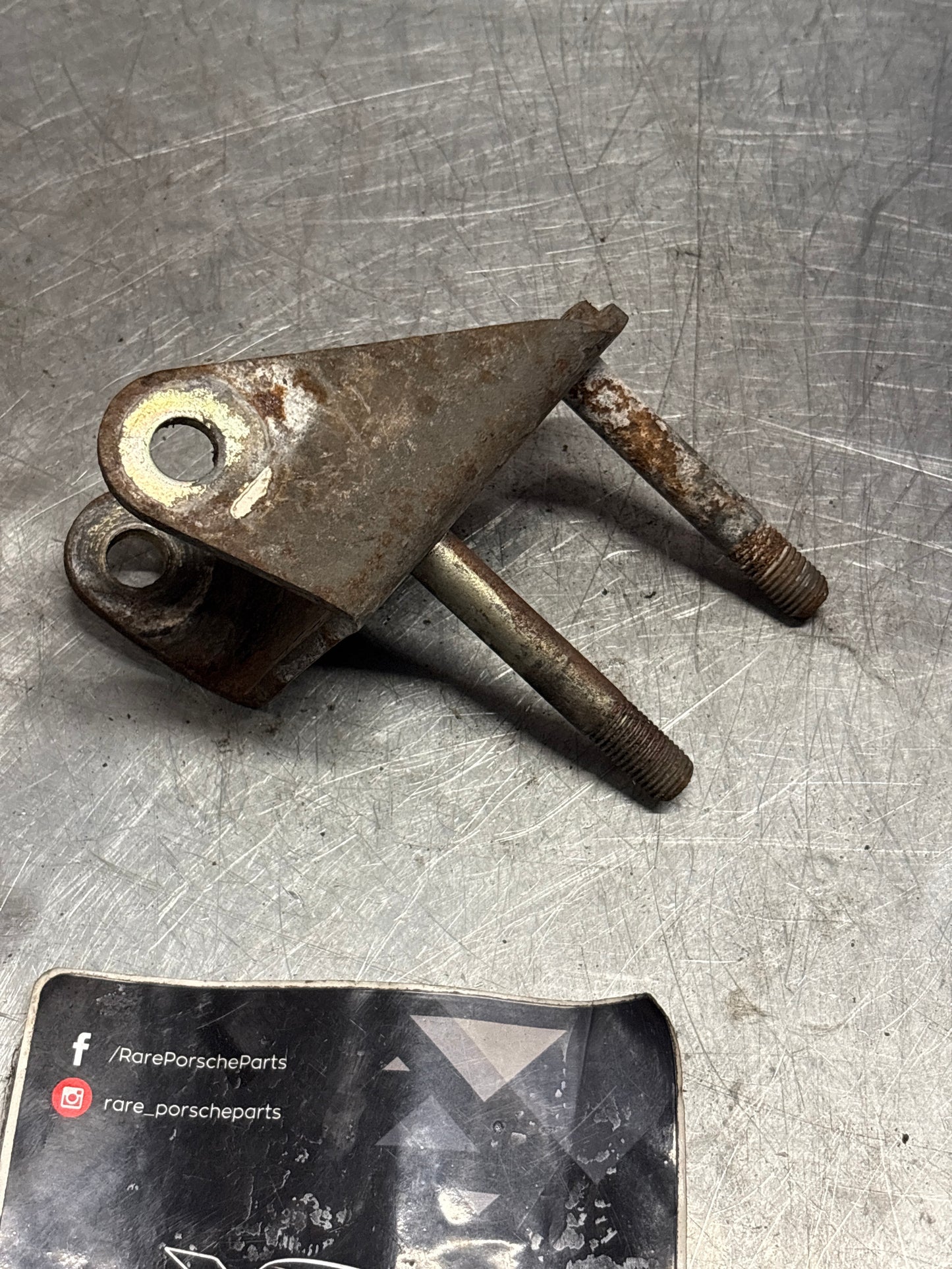 Porsche 928S/S4 Wishbone stabilizer bracket, left, used 92834109105