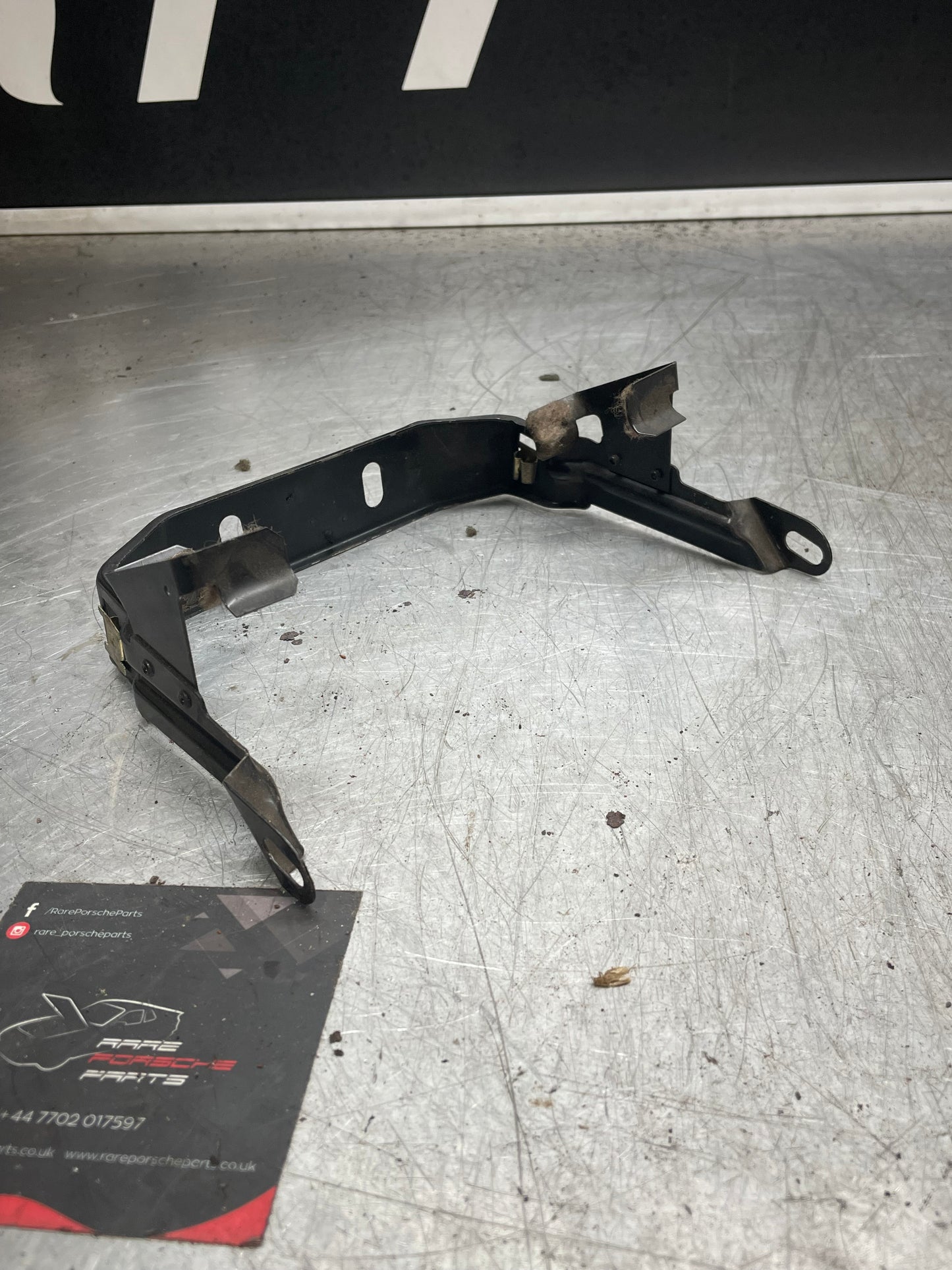 Porsche 944 center console bracket, refurbished 94455206702