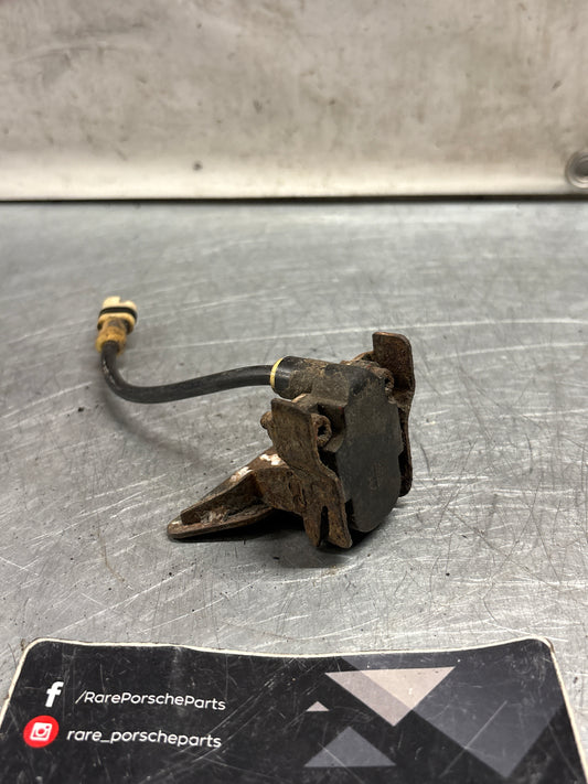 Porsche 928 S4 Tire pressure sensor with bracket, used 92860641400 / 0335569987 / 92833108101