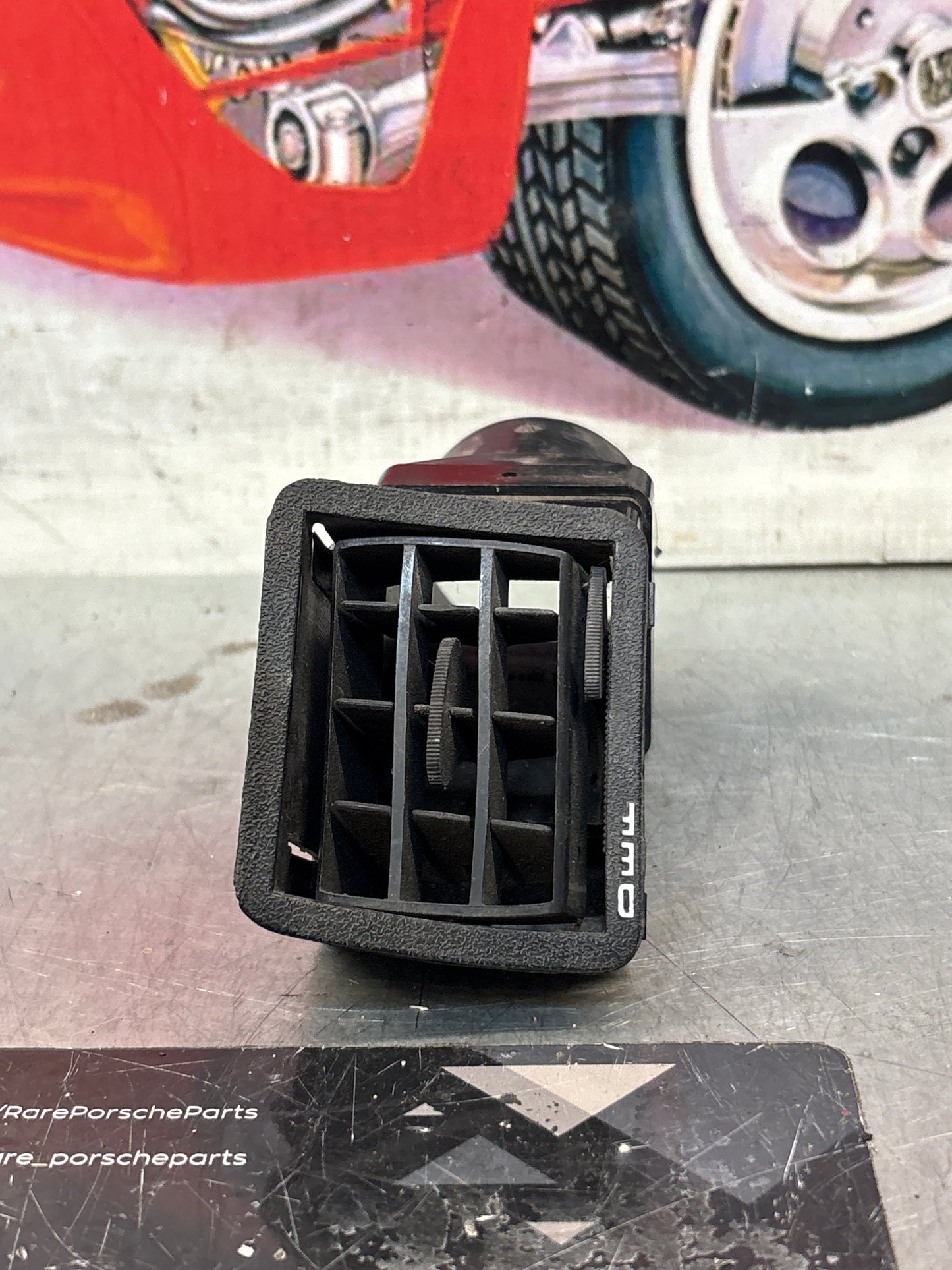 Porsche 924/944 Black dash air vent. Right hand, with connecting piece 477819232 / 477819717 used
