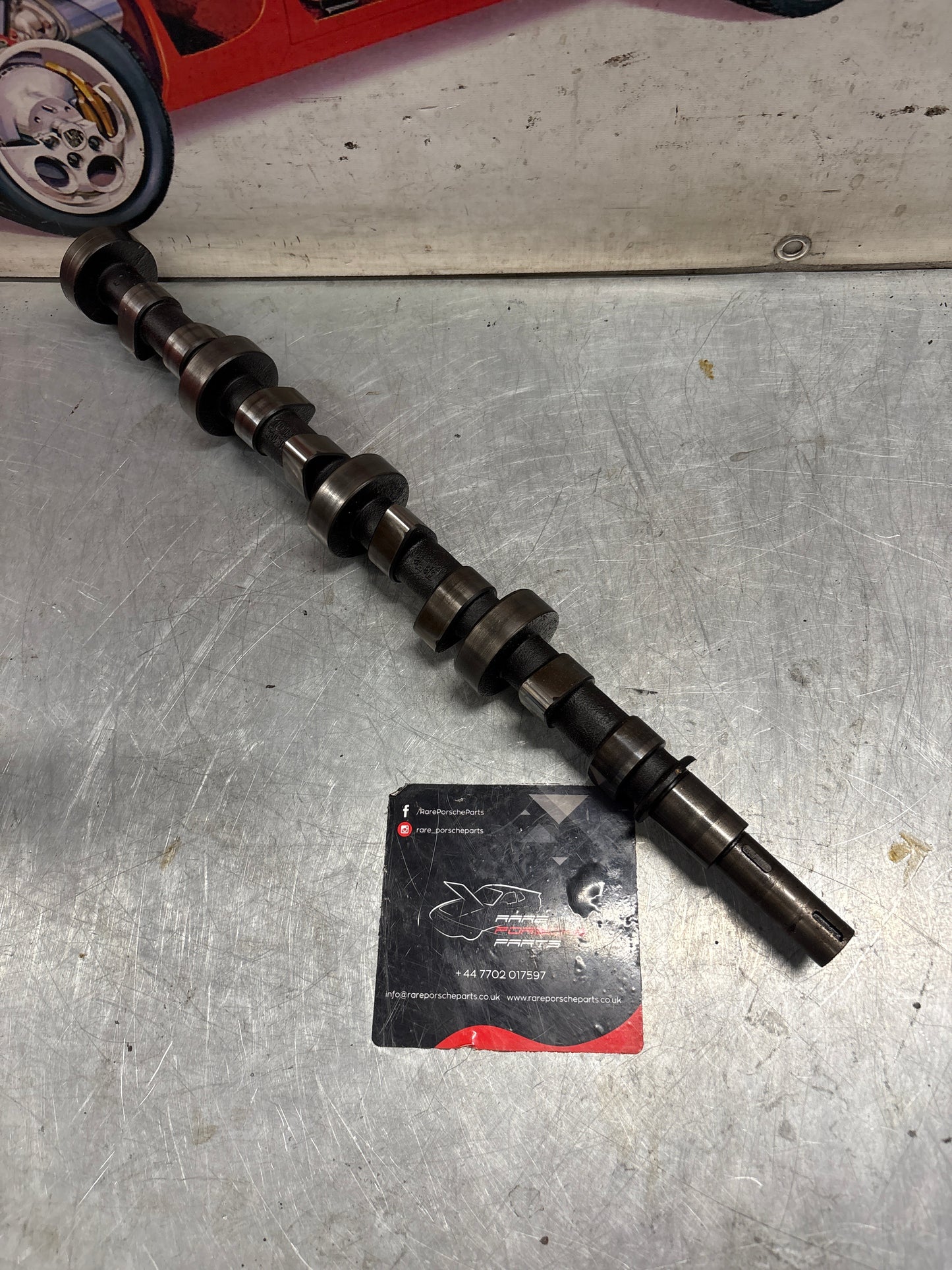 Porsche 928 cam shaft, used 9281051870R