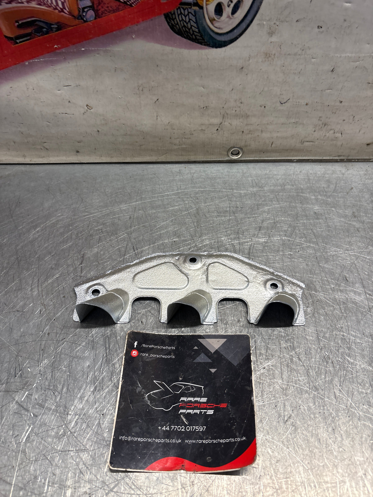 Porsche 924 exhaust heat shield / spark plug shield, refurbished 047129593
