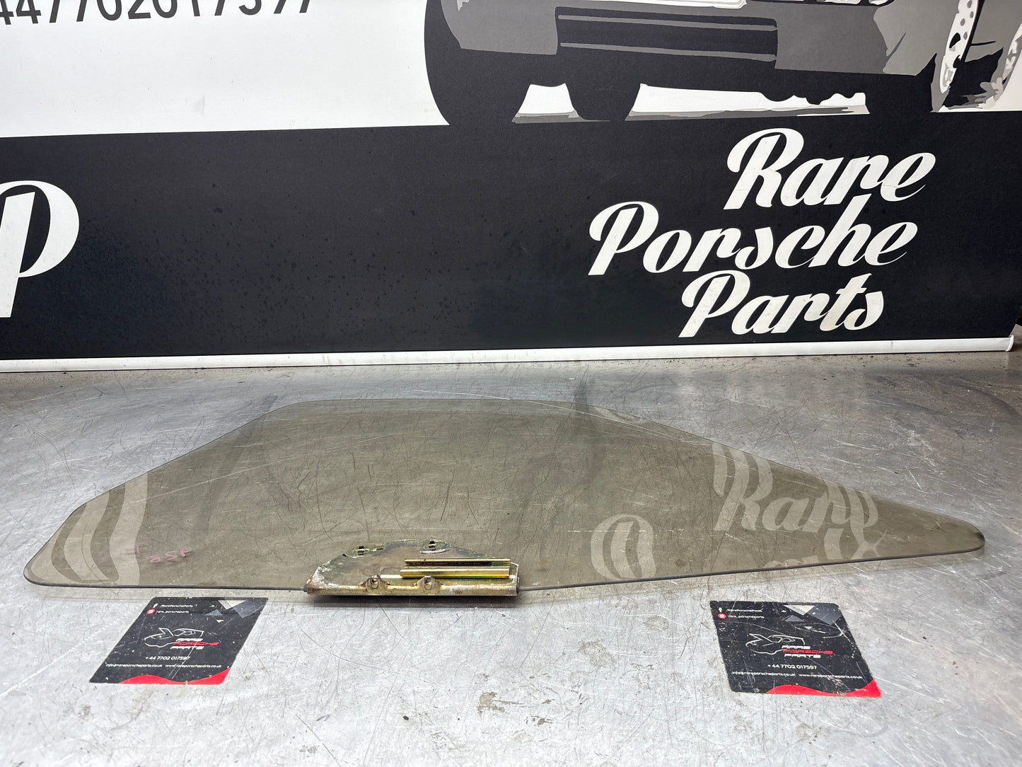 Porsche 928 left side door window glass, brown tinted 92853701502 used