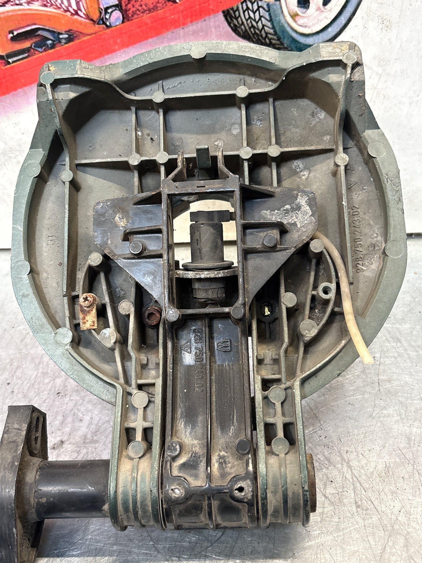 Porsche 928 left headlight swivel frame 92875024902 92875024302 used
