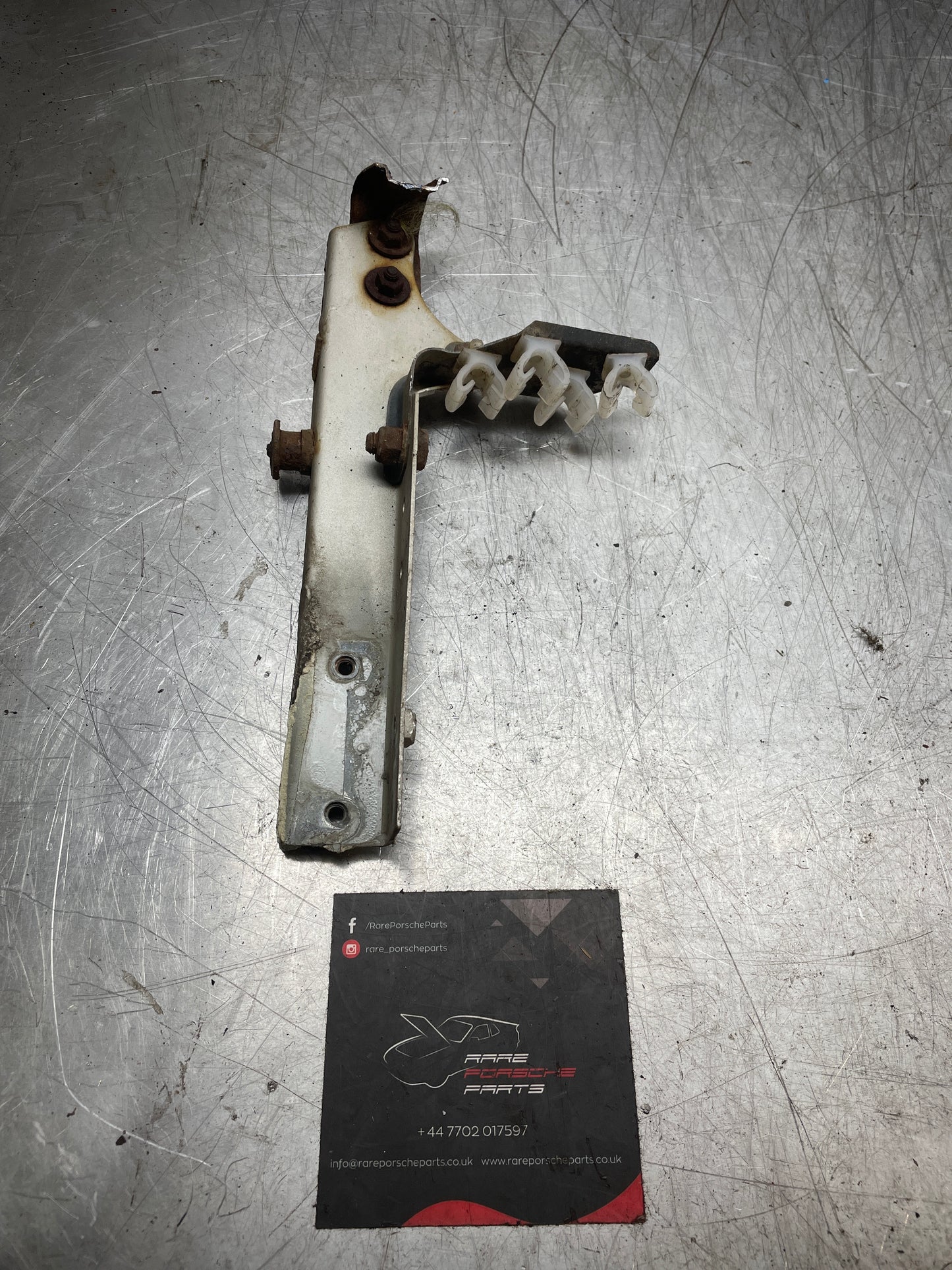 Porsche 924 944 Used wing to Body Reinforcement bracket, with powersteering cooler bracket, left 477805058A used