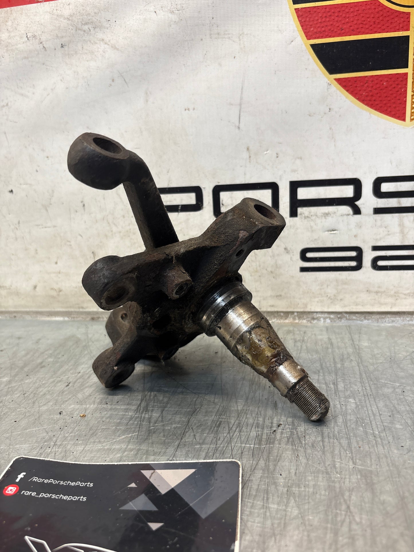 Porsche 928 left steering spindle knuckle, used 92834105703