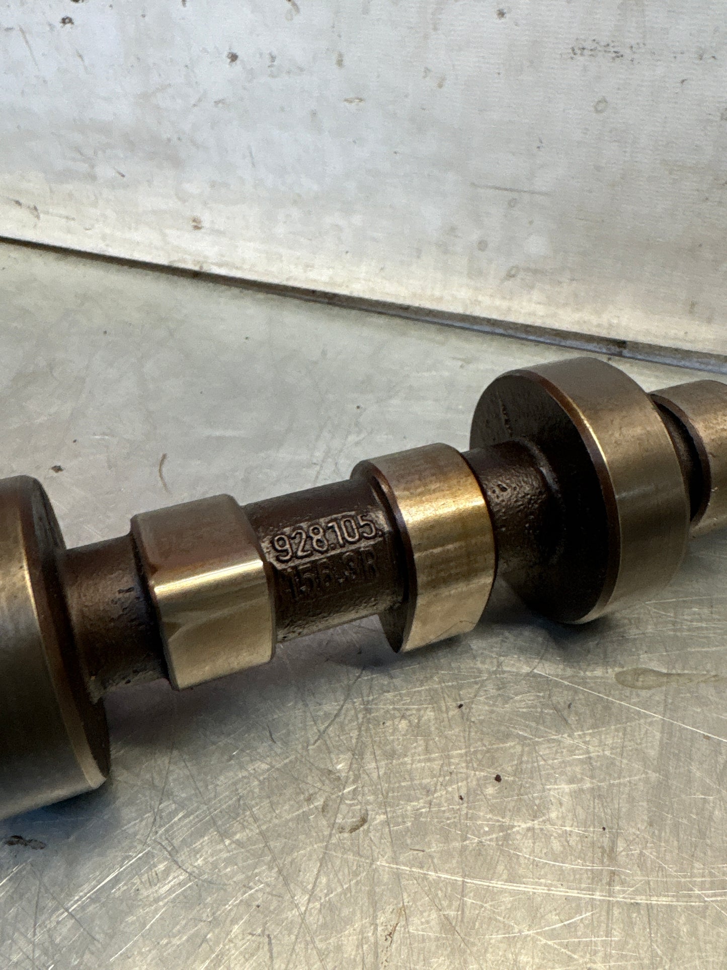 Porsche 928 cam shaft, used 9281051563R