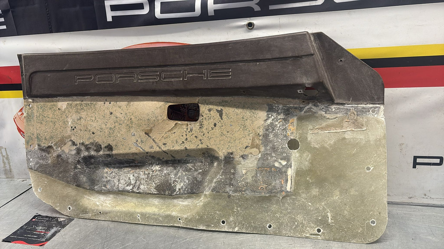 Porsche 924 / 944 early left manual Used door card, Porsche scripted brown, 477867011 no fabric!