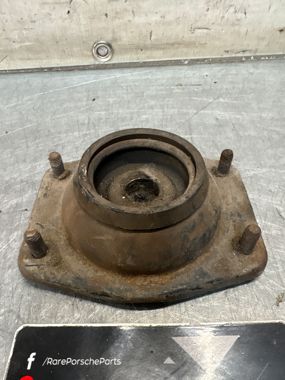 Porsche 924 / 944 front suspension bearing flange, 477412345, used