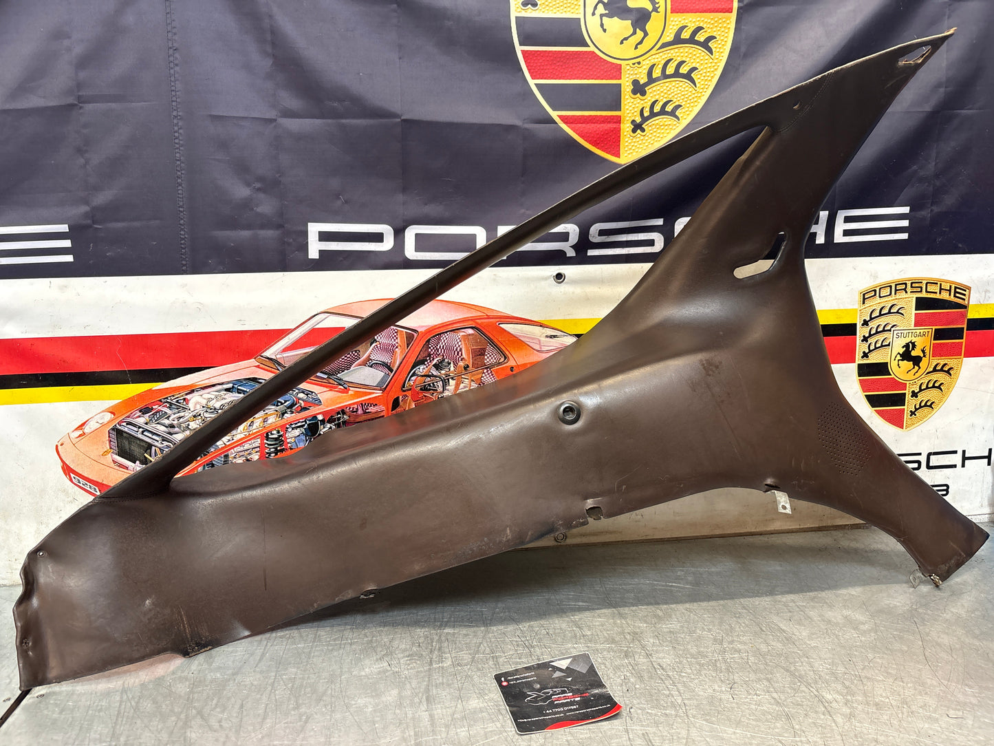 Porsche 928 early left side lower side trim panel, without loudspeaker, brown used 92855502102