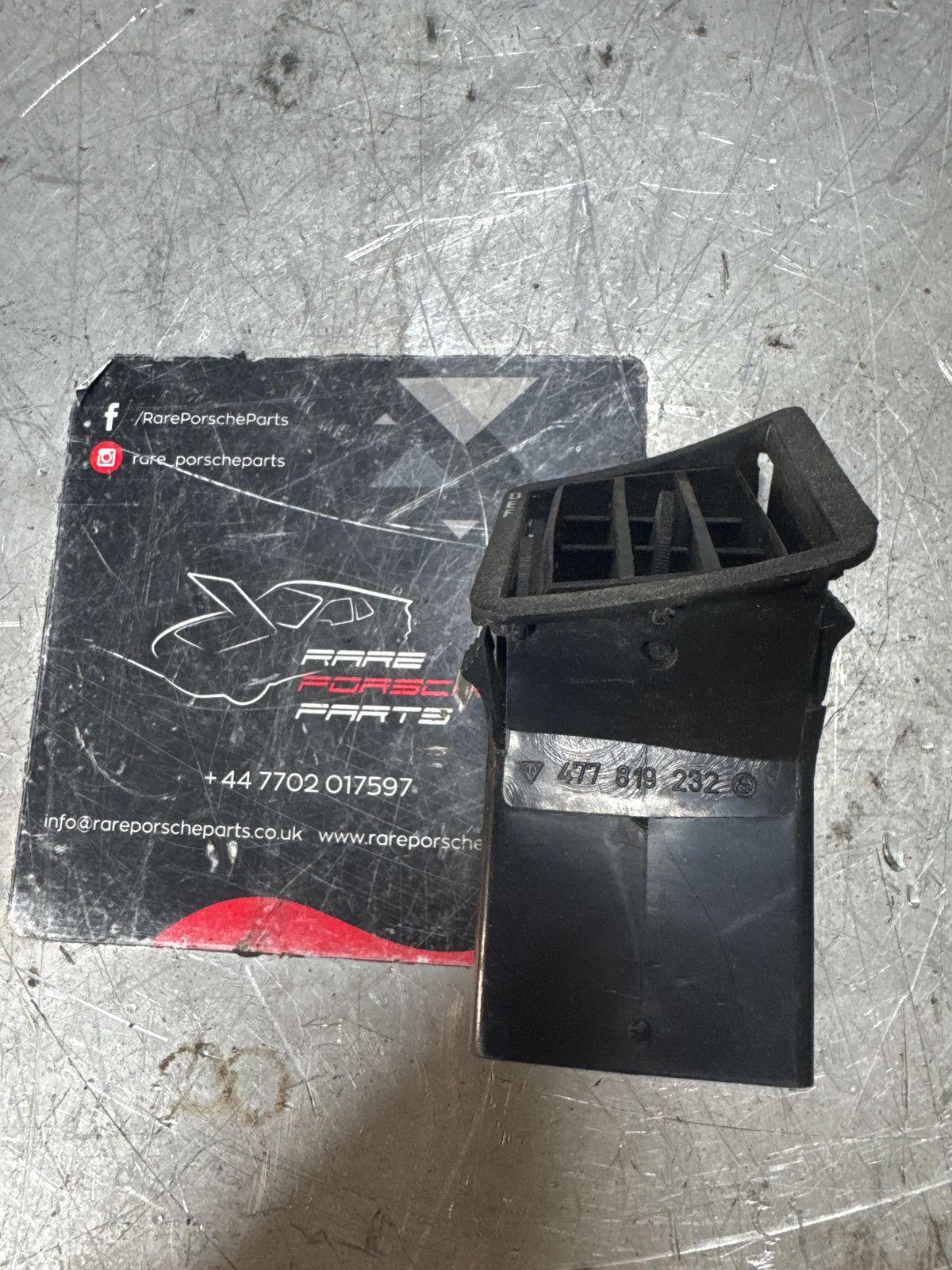 Porsche 924/944 Black dash air vent. Right, with connecting piece 477819232 / 477819717 used spares or repair