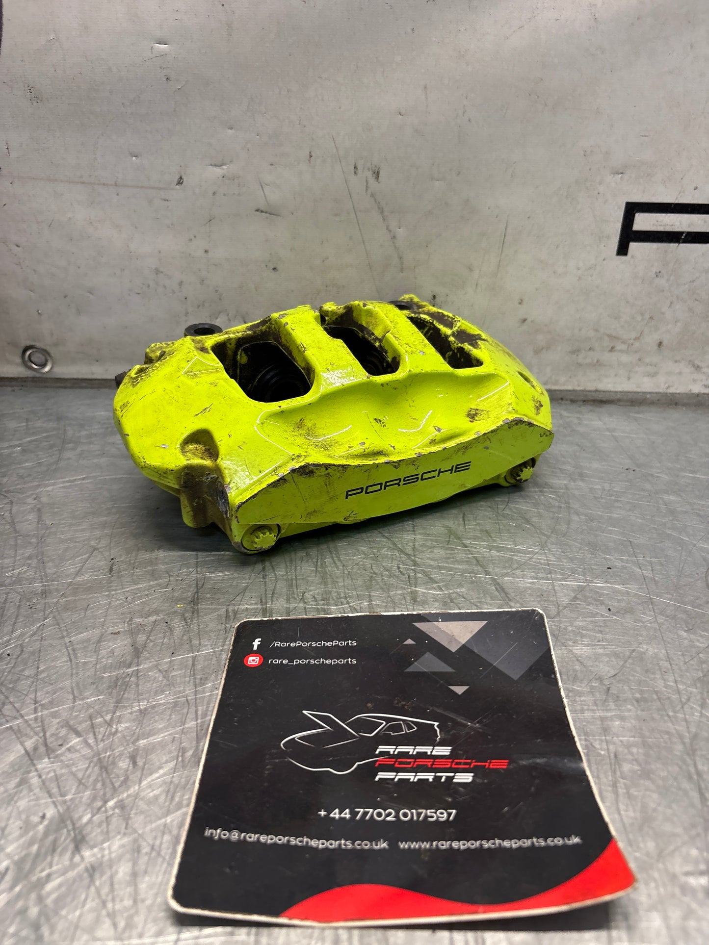 Porsche Cayenne rear passenger side brake caliper, used 7P0615424