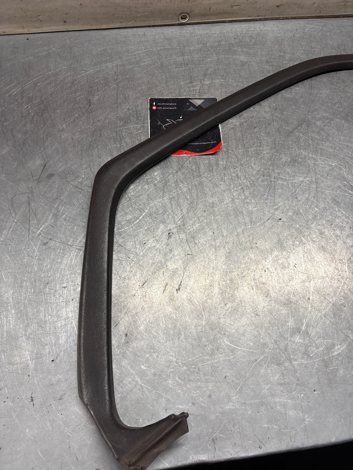 Porsche 928 left, off side door upper frame surround trim, brown 92855502502, used