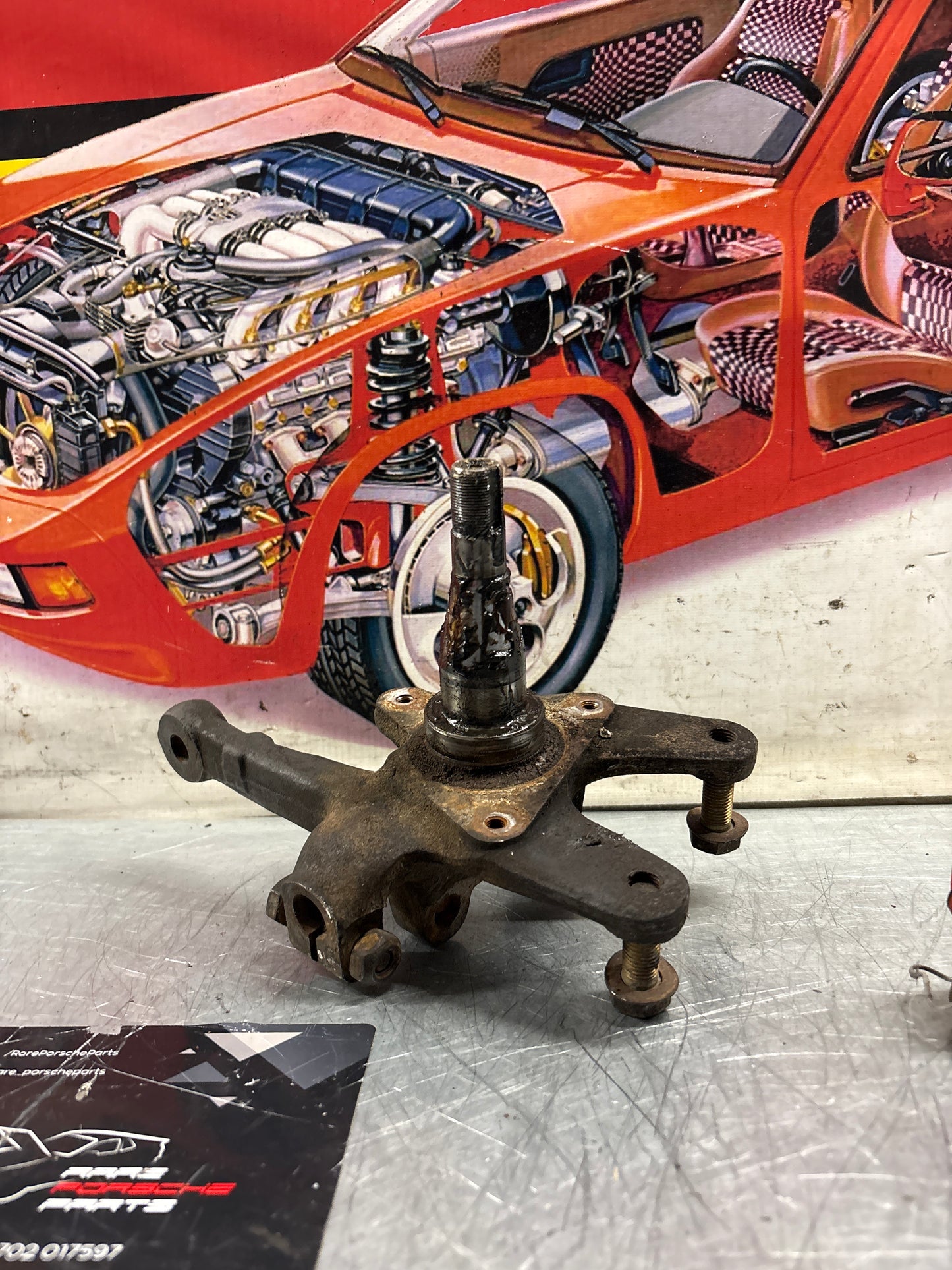 Porsche 944 Turbo front left steering knuckle, without abs, used 95134165501