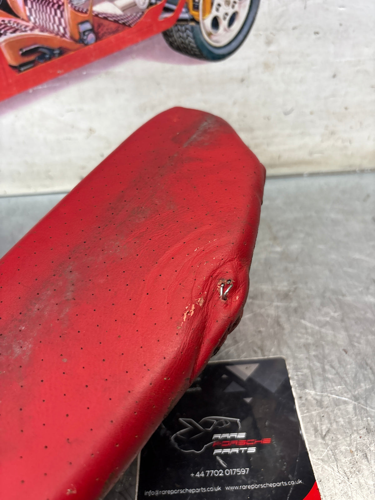 Porsche 928 rear left seat centre cushion, can-can red , leather, used 92852208751
