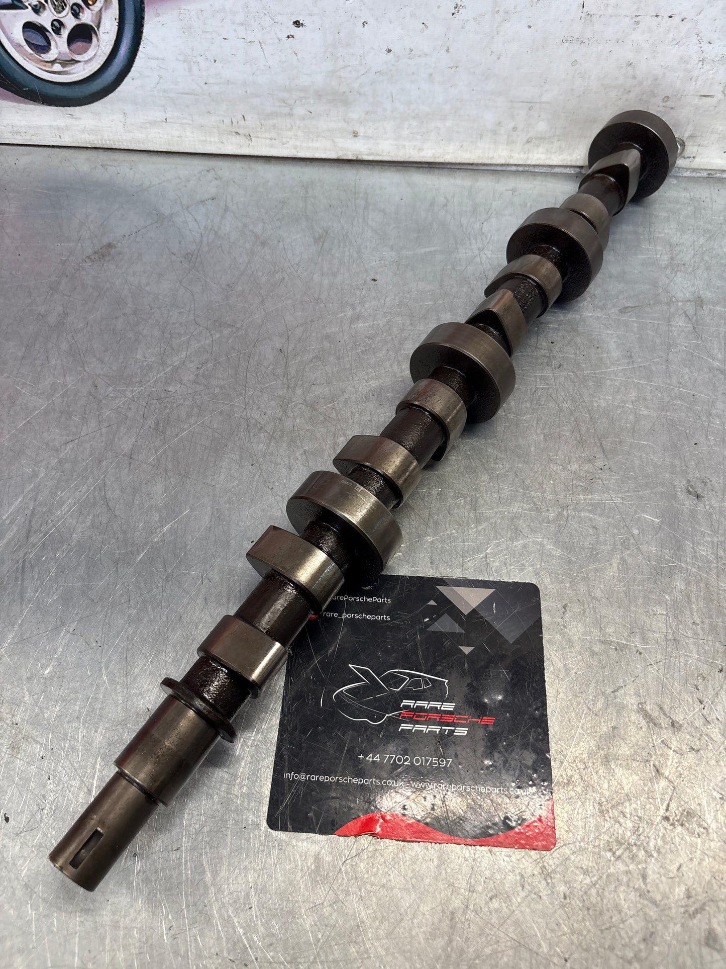 Porsche 928 cam shaft, used 9281051553R