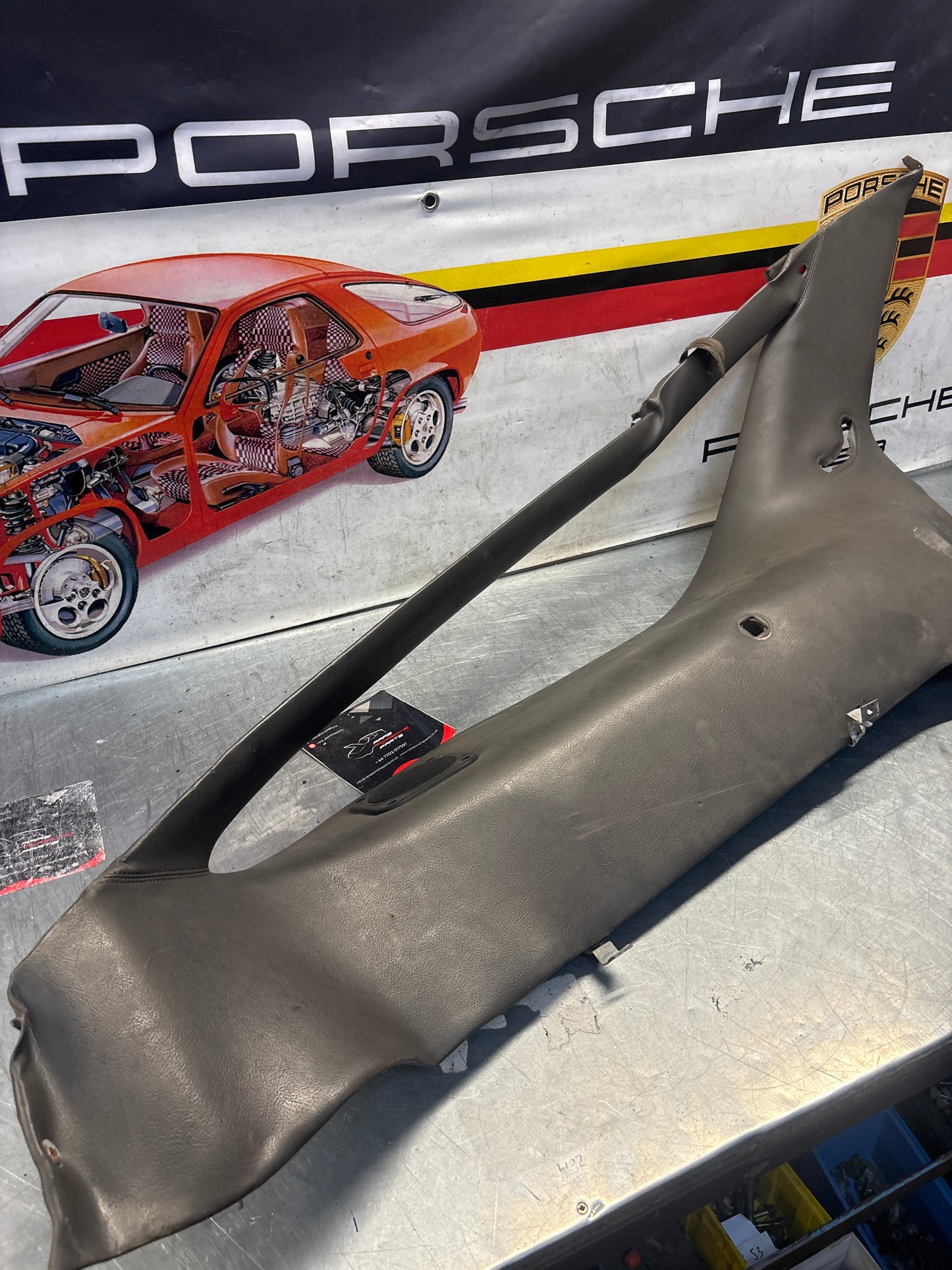 Porsche 928 left side lower side trim panel, grey used 92855502157