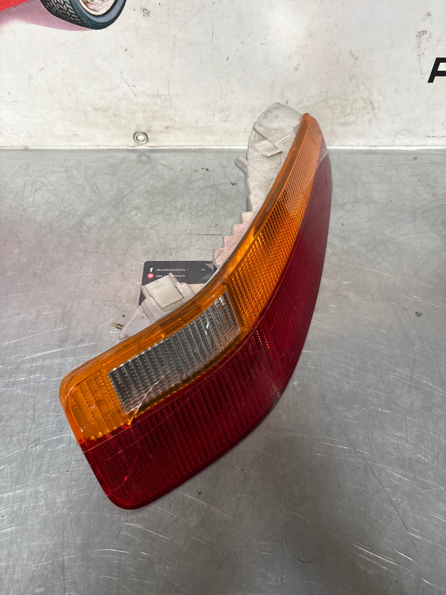 Porsche 928 rear right tail light, used 92863104401, cracked