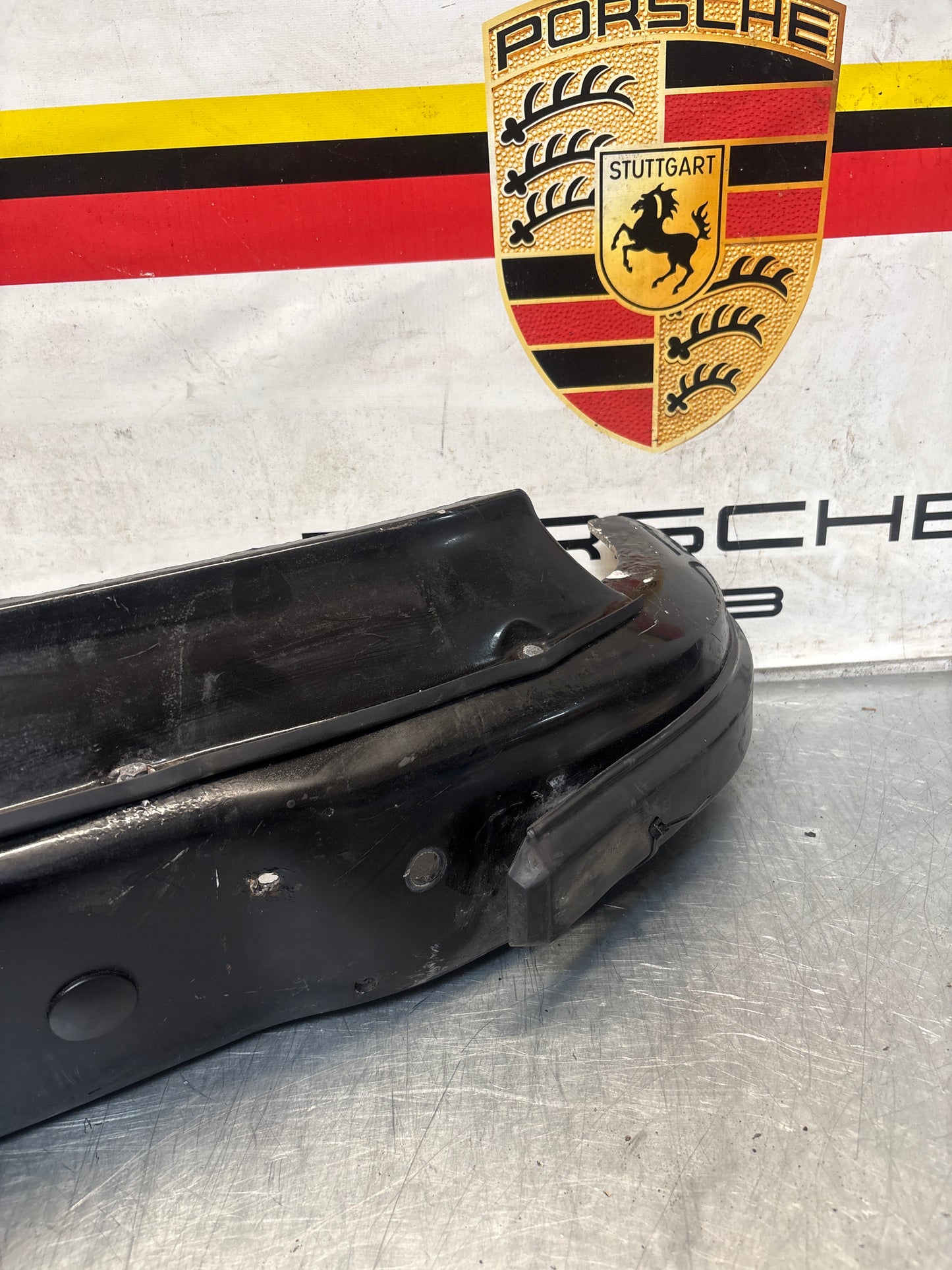 Porsche 911 930 rear bumper with skirt, used 93050511201