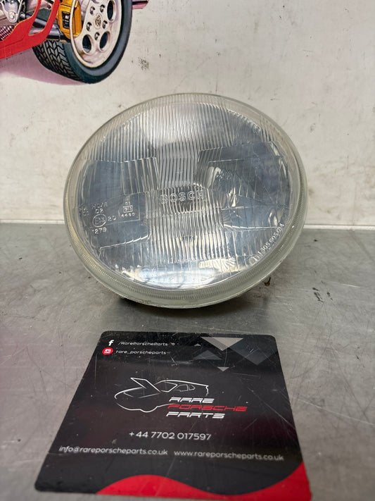 Porsche 968 right side Bosch headlight, used 94463192900 / 0301900306 / 1305304021