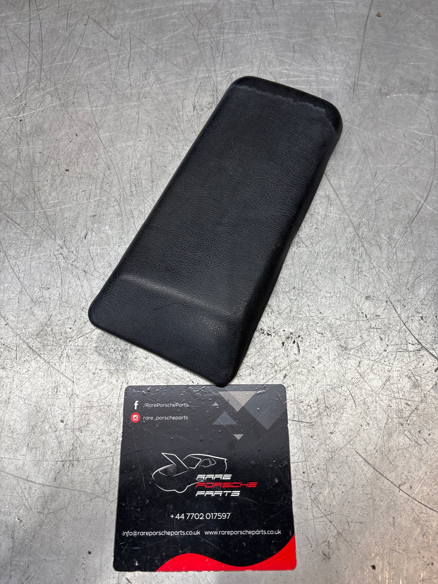 Porsche 944 86-92 arm rest top black 94555206300 used RHD, faded