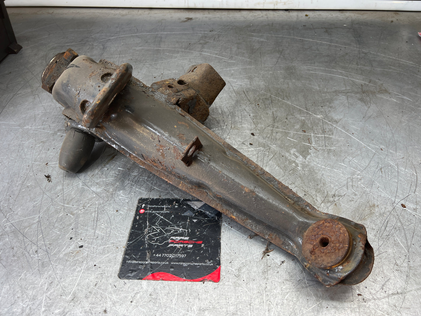 Porsche 924 944  -85.5 Rear left trailing arm, 94433102100