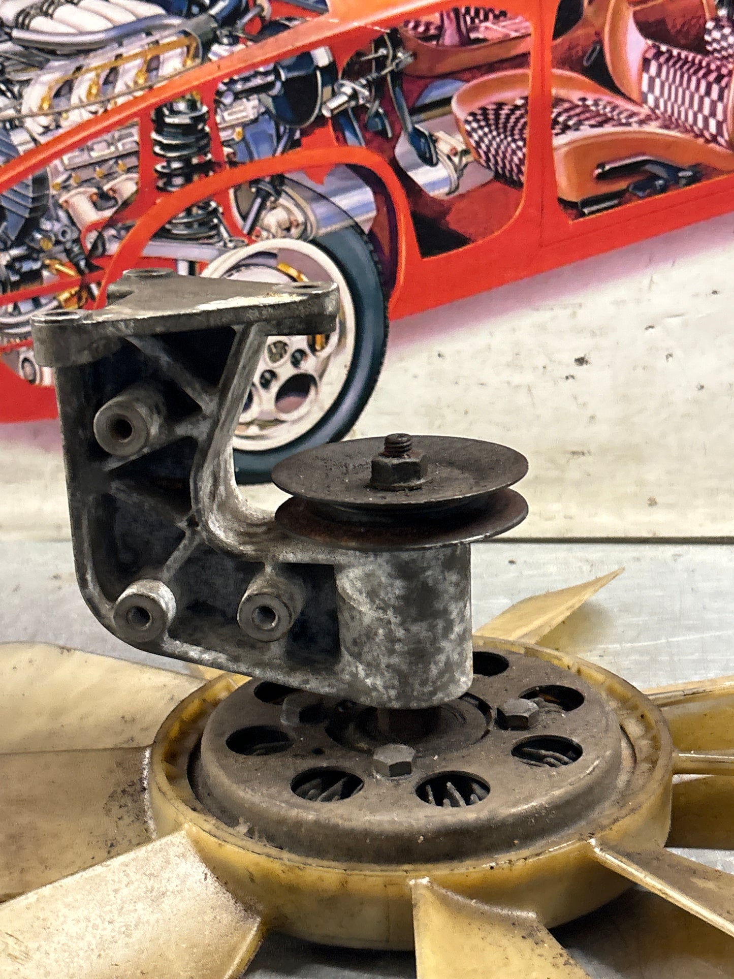 Porsche 928 late engine cooling fan clutch with bracket, used 92810611205 / 92810613701 / 9281061104R