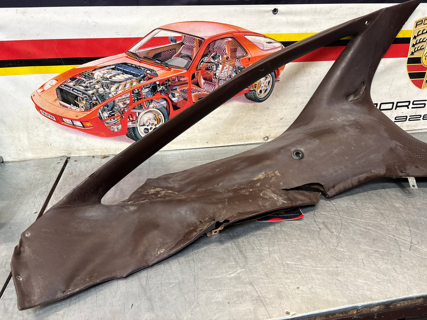 Porsche 928 early left side lower side trim panel, without loudspeaker, burgundy used 92855502102