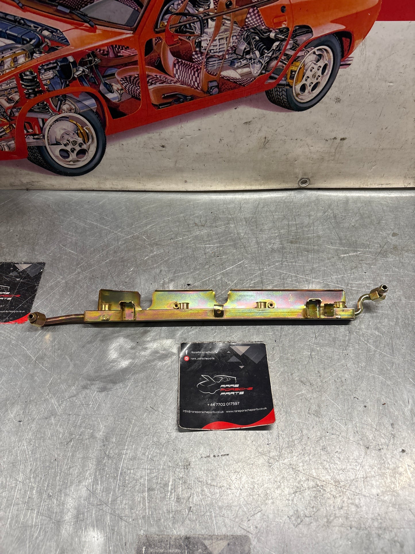 Porsche 928 S fuel rail, left, refurbished 92811007911