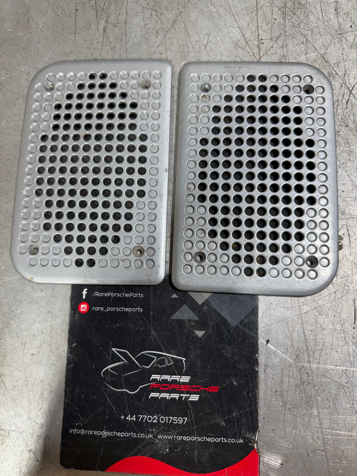 Porsche 924/944 pairs of door speaker grill trim cover in painted silver 477867081 / 8605260192 used