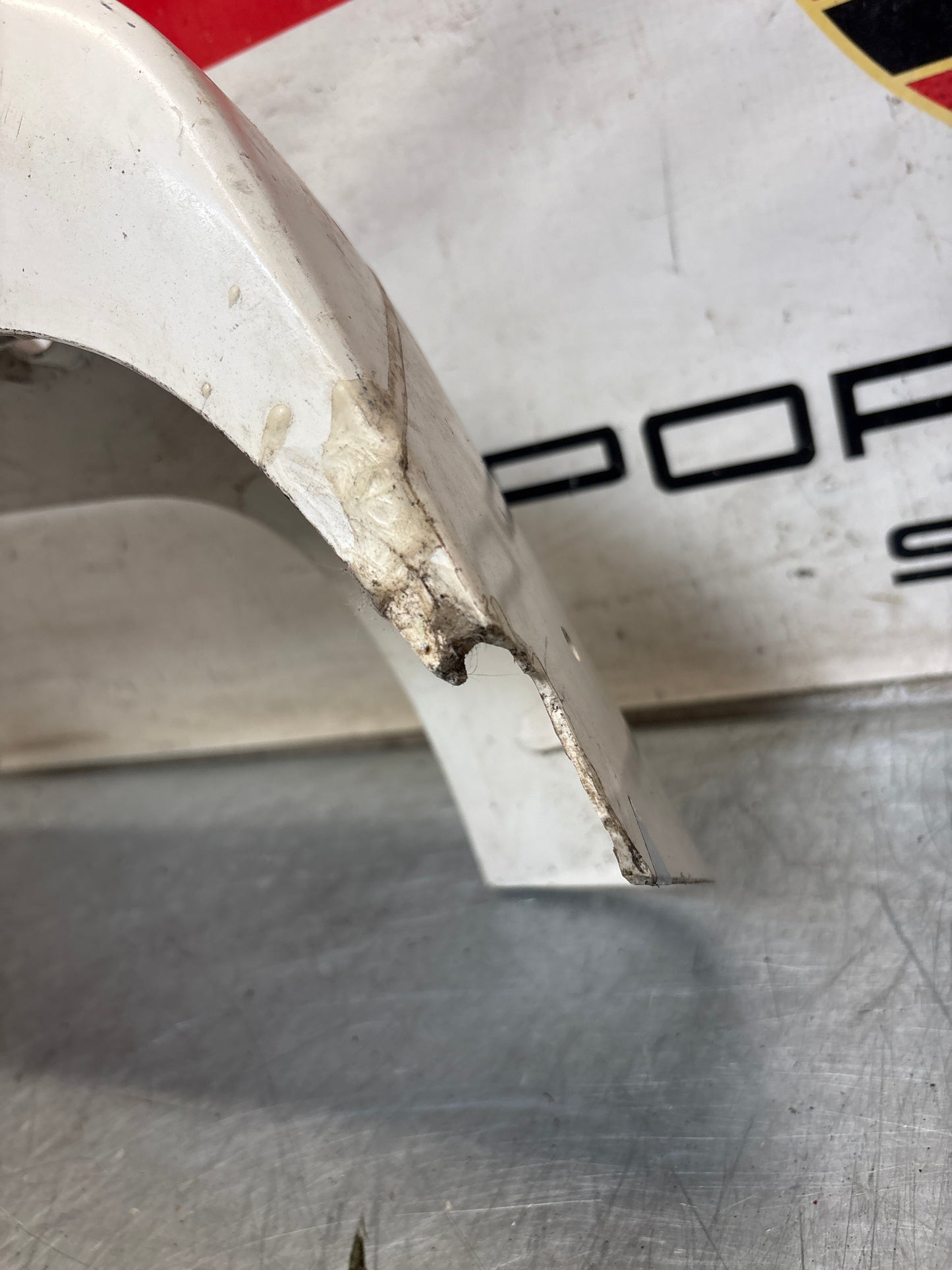 Porsche 944 rear bumper, NOS damaged 93150538700
