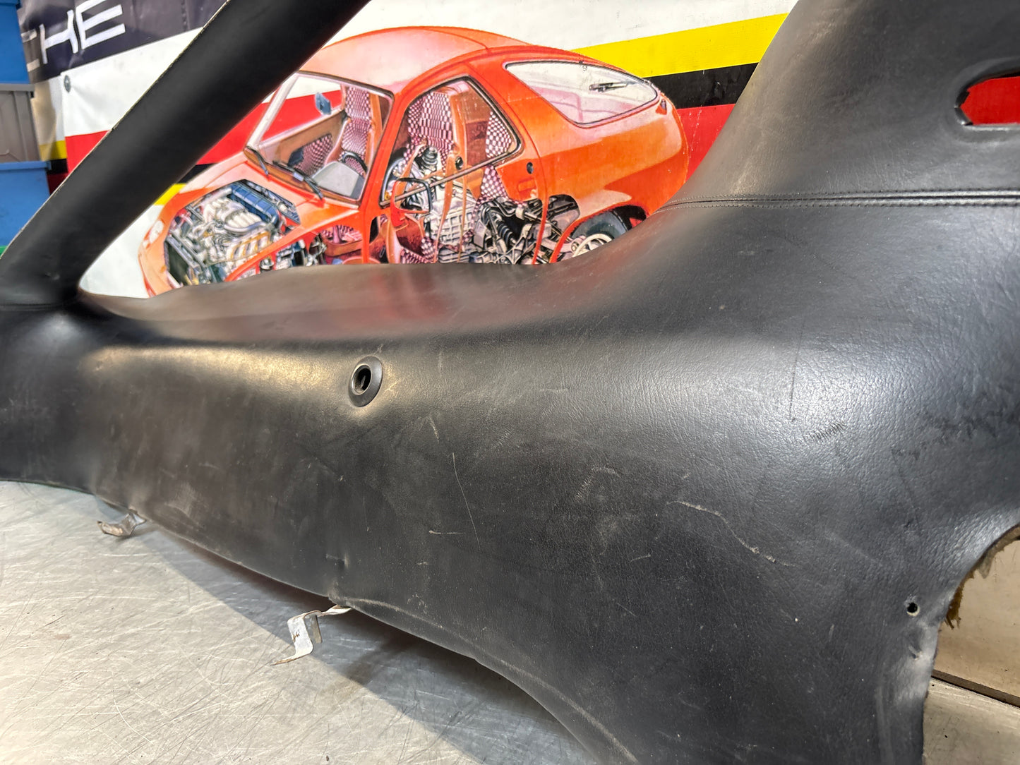 Porsche 928 early left side lower side trim panel, without loudspeaker, black used 92855502102