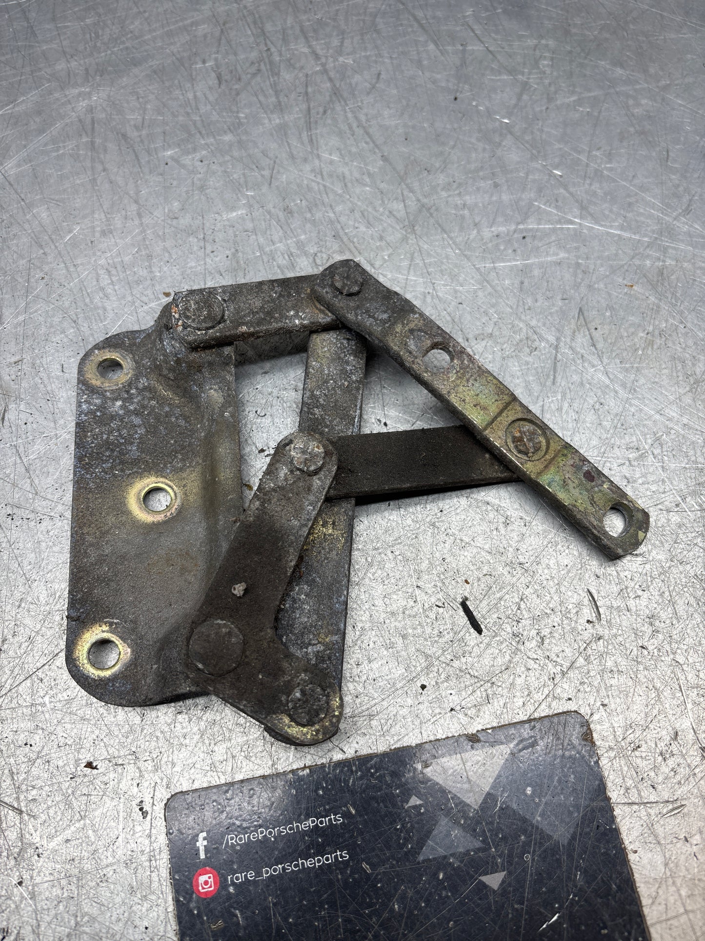 Porsche 928 left hand side bonnet hinge, used 92851104104
