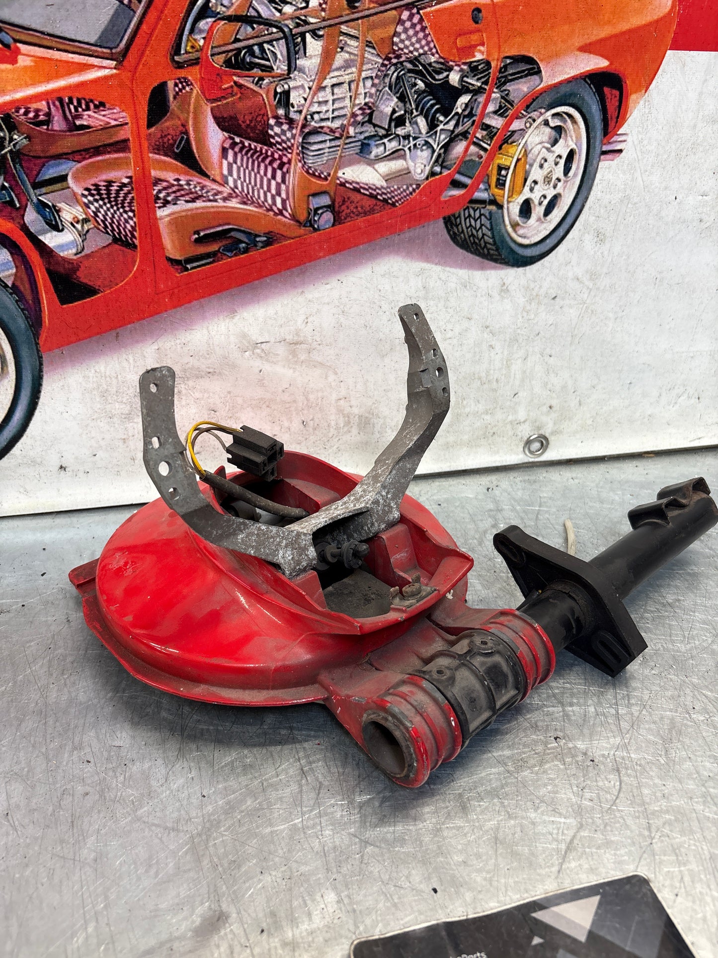 Porsche 928 left headlight swivel frame 92875024902 92875024302 used