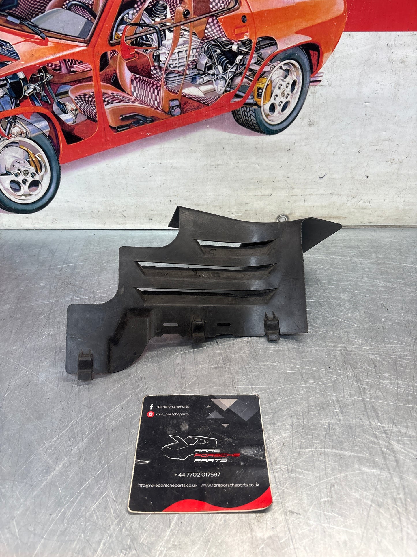 Porsche 968 left front wheel housing extension, genuine 94450438501