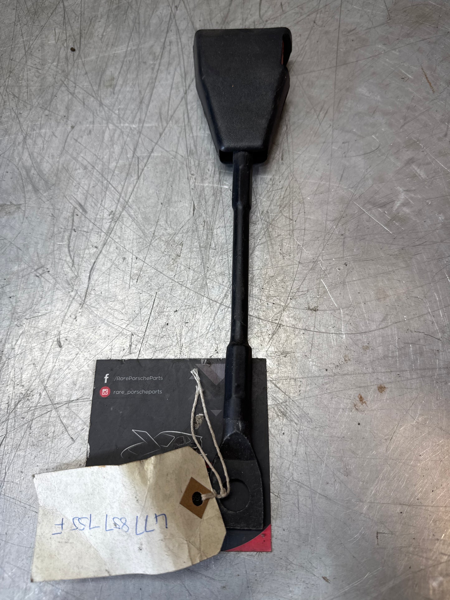 Porsche 924 early left seat belt anchor clasp retainer, buckle. 477857755D NOS