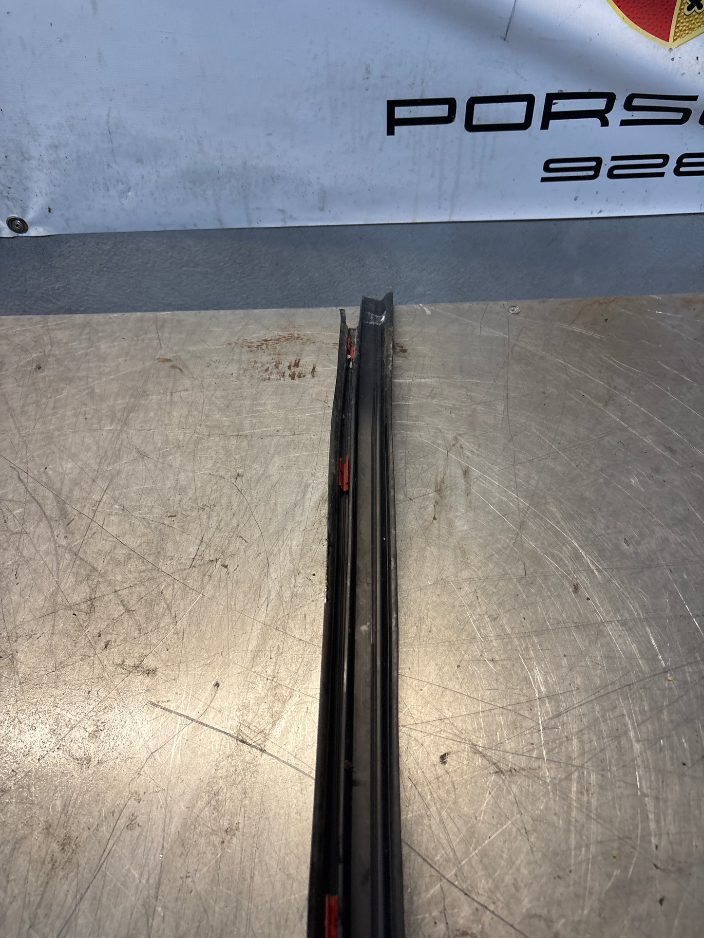 Porsche early 924/944 left sill trim, used 477853657A