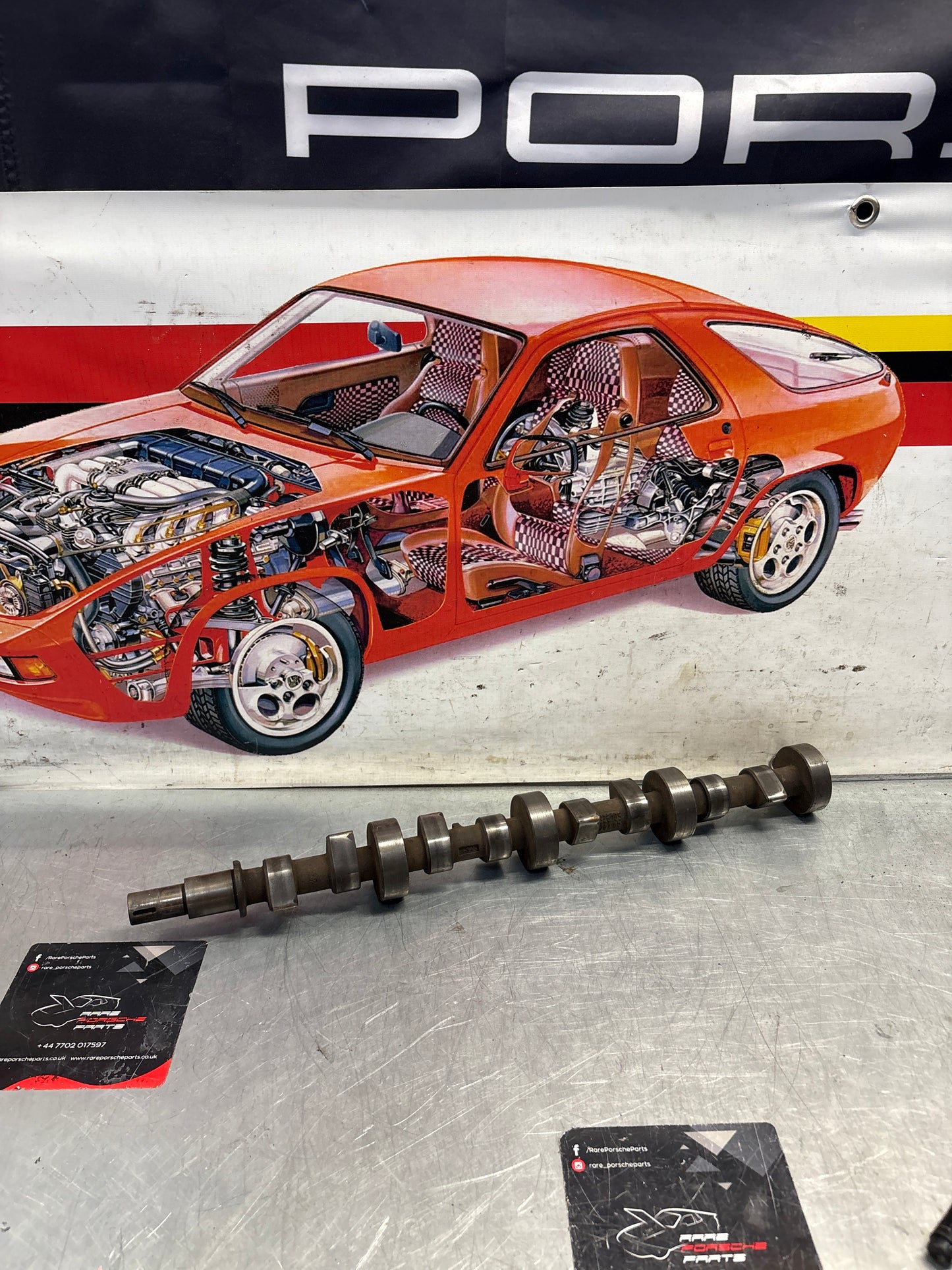 Porsche 928 cam shaft, used 9281052030R