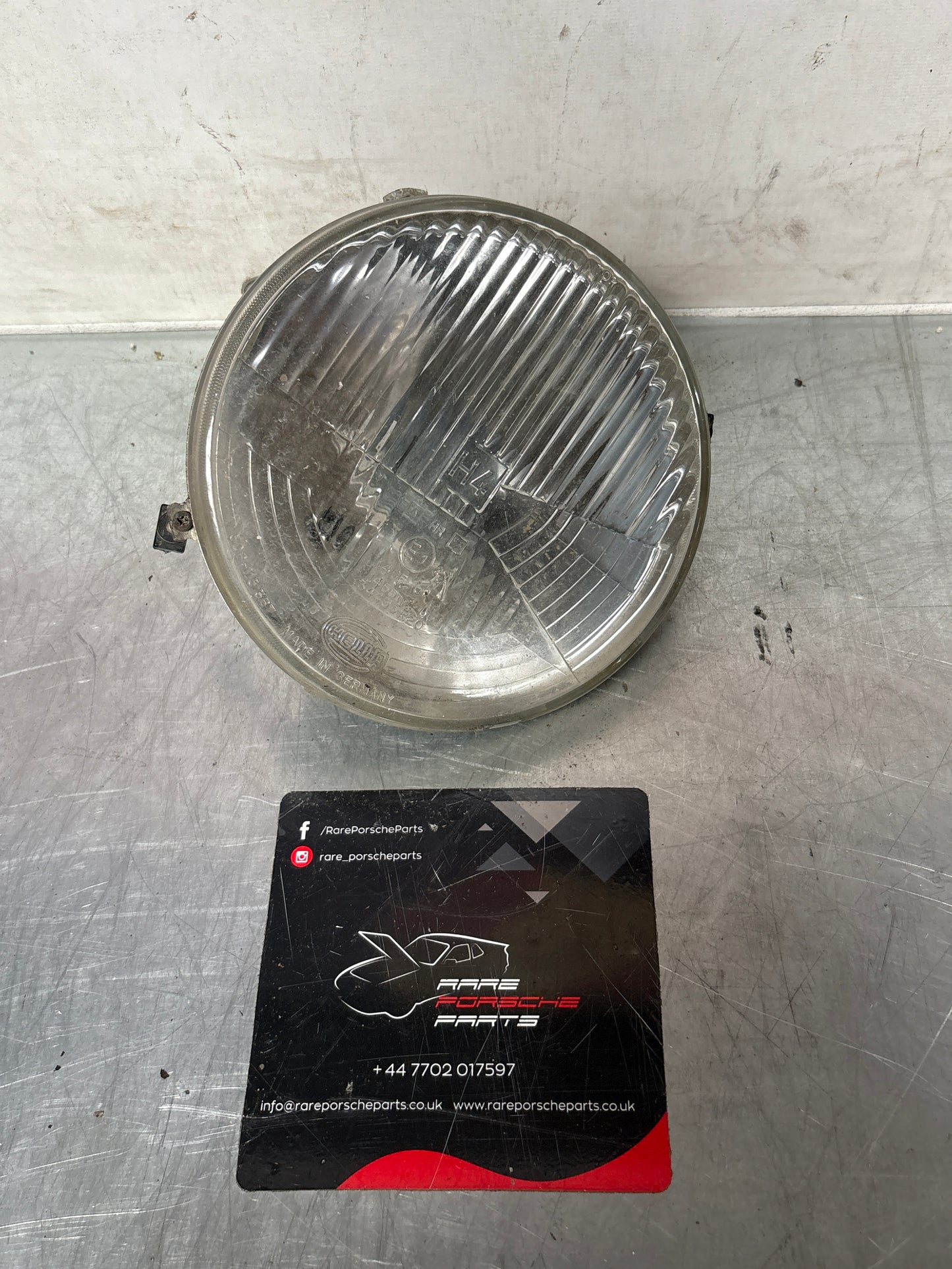 Porsche 924 944 Hella h4 headlight, LHD used 477941771 7R0114551 / 0234495 / 0214551