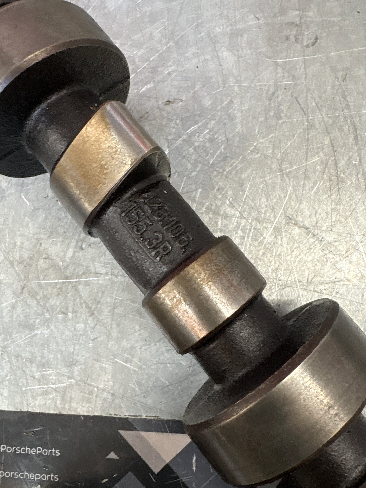 Porsche 928 cam shaft, used 9281051553R