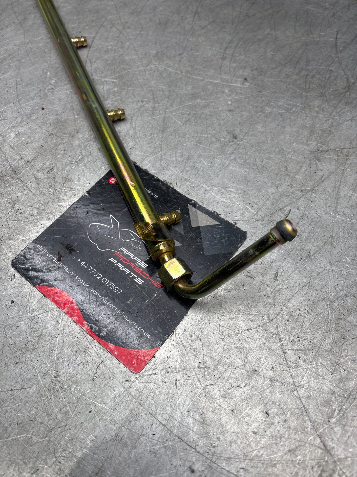 Porsche 928 fuel tube left, refurbished 92811007906