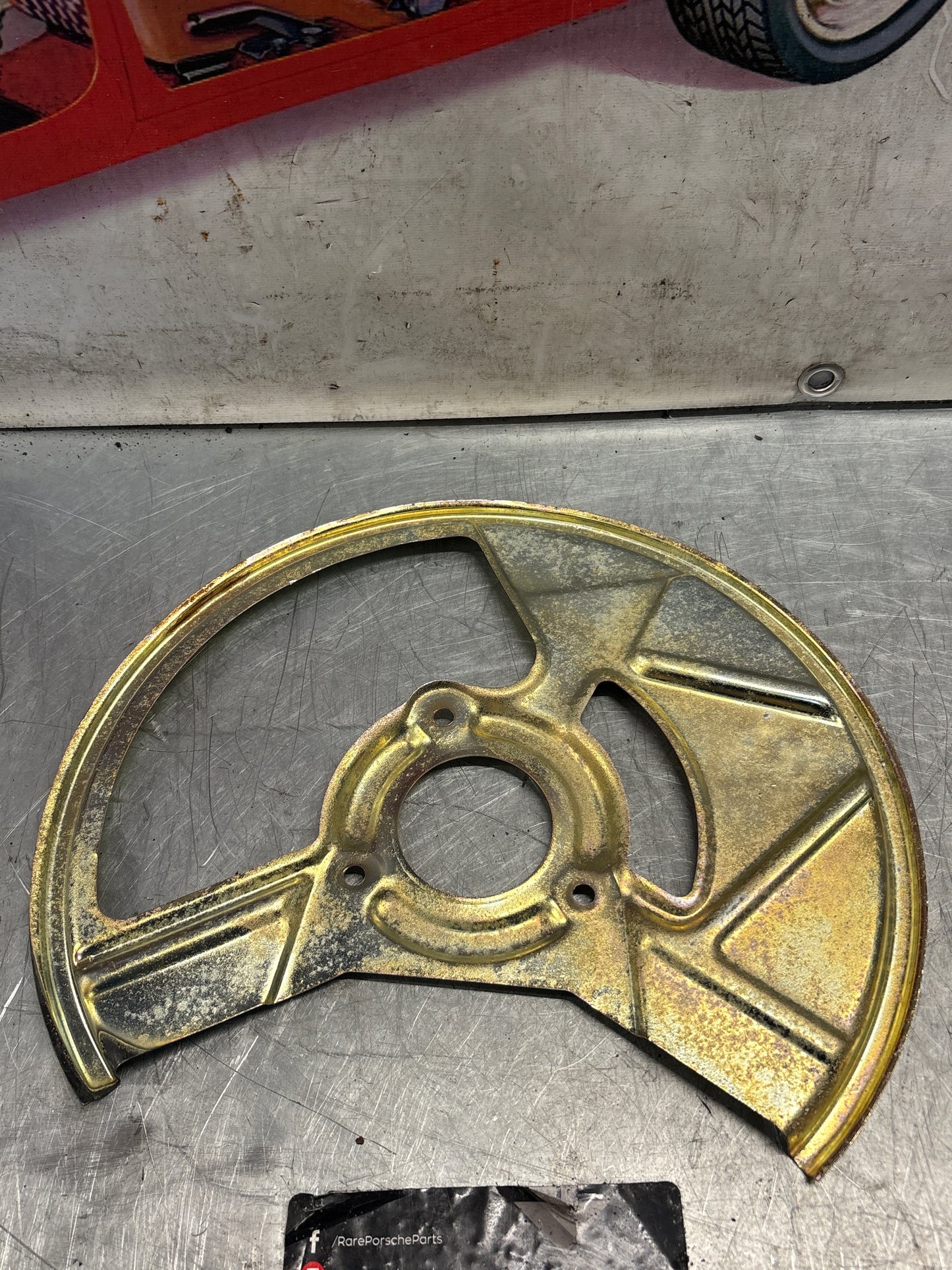 Porsche 968 front left brake dust cover plate, used 95135180502