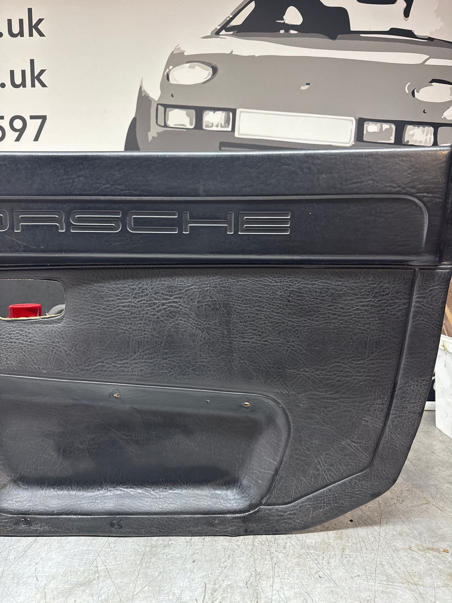 Porsche 924/ Early 944 Black RHD Drivers door card, Porsche Script. Fibreglass repaired. 478867011